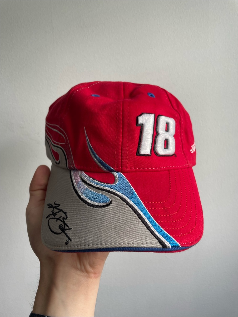 Vintage Red NASCAR Cap with Number 18 and Flame Accent